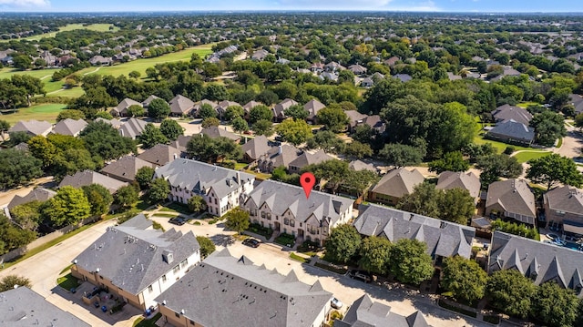 drone / aerial view featuring a residential view and view of golf course