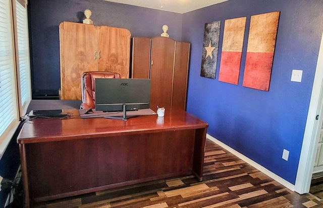 unfurnished office featuring dark wood-type flooring