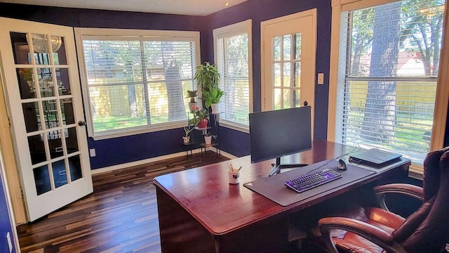 office area with dark hardwood / wood-style floors and french doors