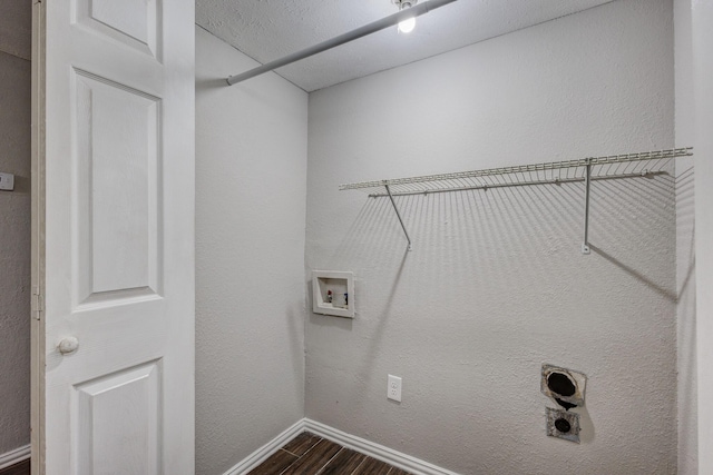 laundry room featuring hookup for an electric dryer, dark wood-type flooring, and washer hookup