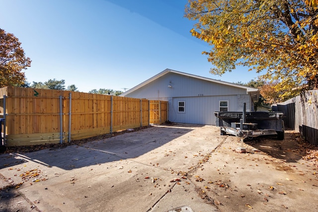 back of property featuring a patio area