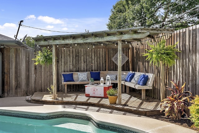 view of swimming pool with a deck