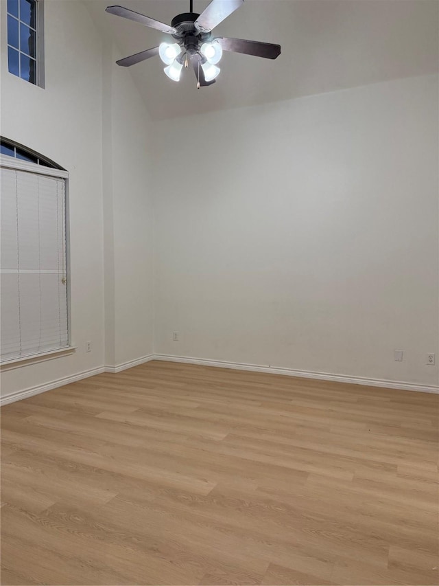 unfurnished room featuring ceiling fan and light hardwood / wood-style floors