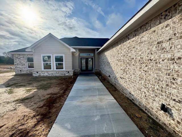 property entrance featuring french doors