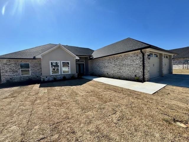 single story home with a garage