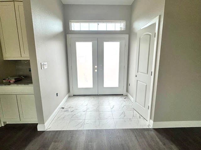 foyer featuring french doors