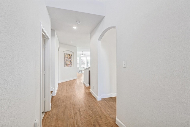 hall with light hardwood / wood-style flooring