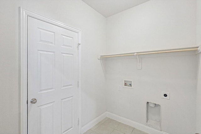 laundry room with laundry area, light tile patterned floors, baseboards, hookup for a washing machine, and electric dryer hookup