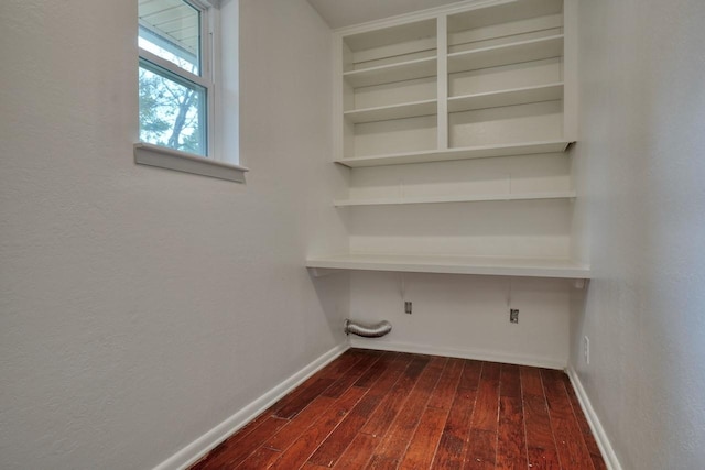 laundry room with dark hardwood / wood-style flooring