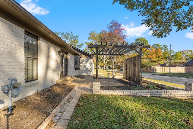 view of yard with a pergola