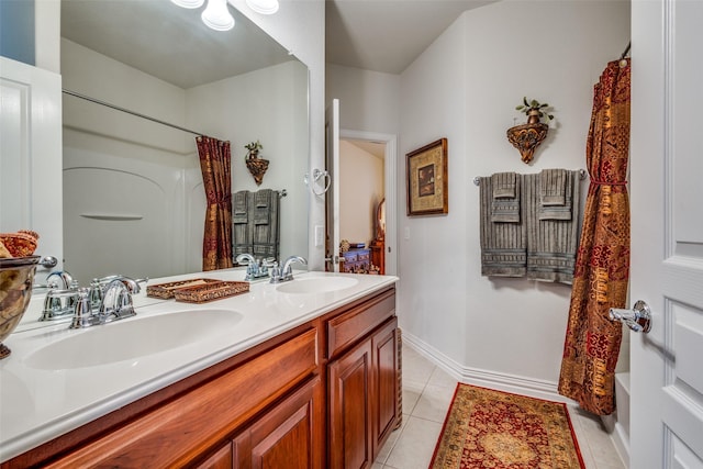 bathroom with tile patterned flooring, vanity, and shower / bath combination with curtain