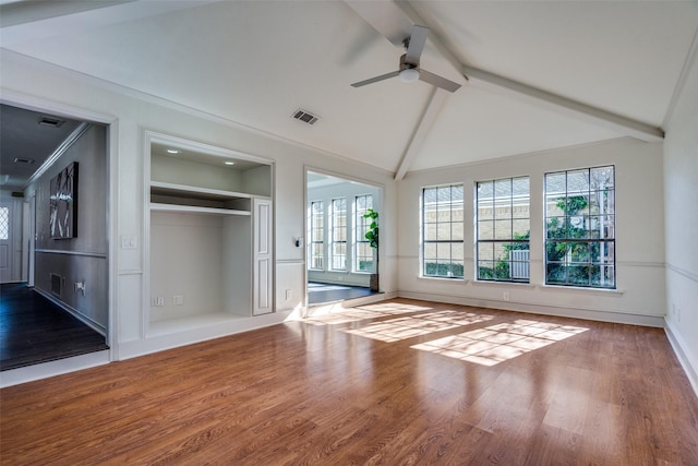 interior space featuring hardwood / wood-style flooring, ceiling fan, beam ceiling, and high vaulted ceiling