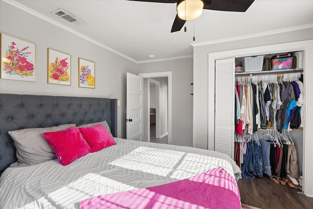 bedroom with dark hardwood / wood-style floors, ceiling fan, and ornamental molding