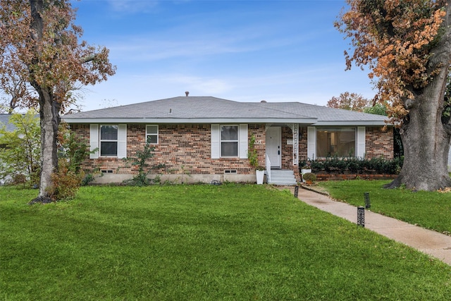 ranch-style house with a front yard