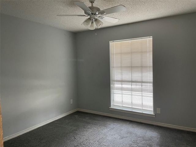 unfurnished room featuring carpet flooring, a textured ceiling, and ceiling fan