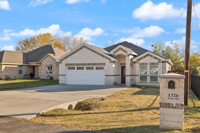 craftsman-style house with a garage and a front yard