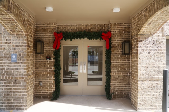 entrance to property featuring french doors