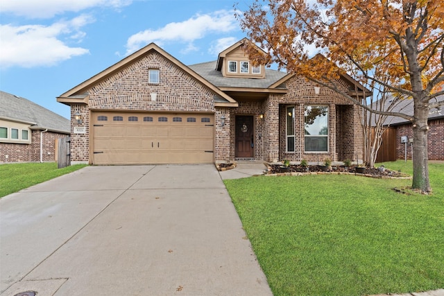 view of front of property with a garage and a front yard