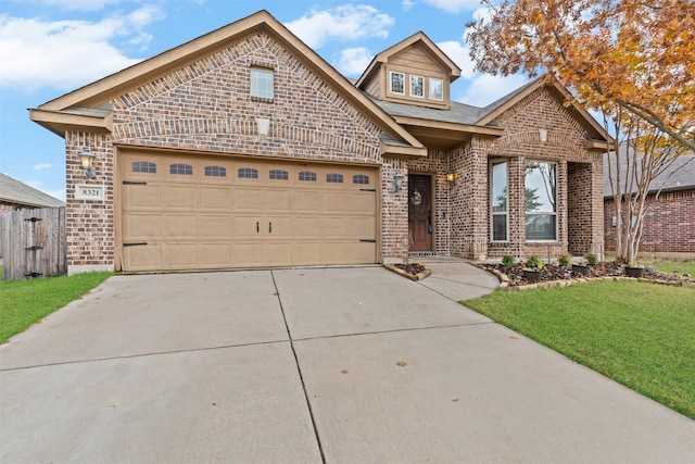 view of front facade featuring a garage and a front lawn