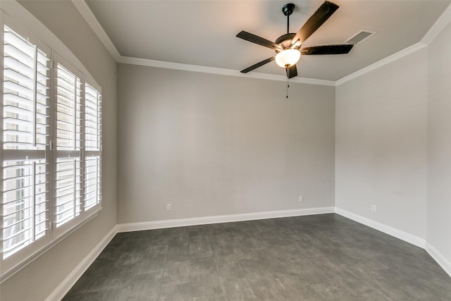 unfurnished room featuring plenty of natural light, visible vents, and ornamental molding