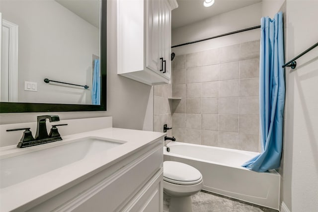 full bathroom with shower / bath combination with curtain, vanity, and toilet