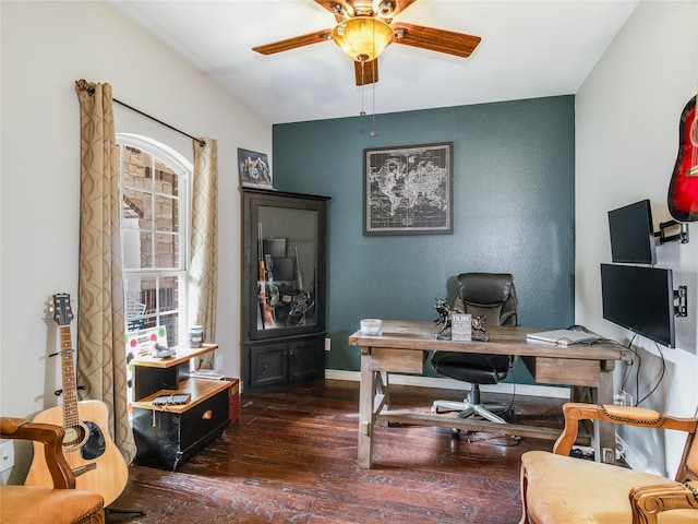 office featuring dark hardwood / wood-style floors and ceiling fan