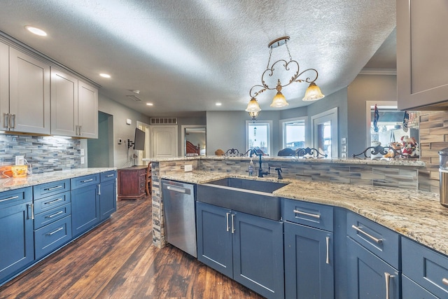 kitchen featuring dishwasher, sink, dark wood-type flooring, decorative light fixtures, and decorative backsplash