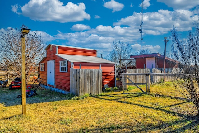 view of outdoor structure with a yard