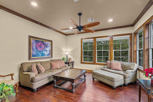 living room with ceiling fan, ornamental molding, and dark hardwood / wood-style floors