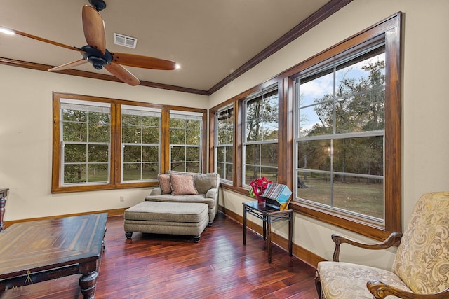 sunroom featuring ceiling fan and a wealth of natural light