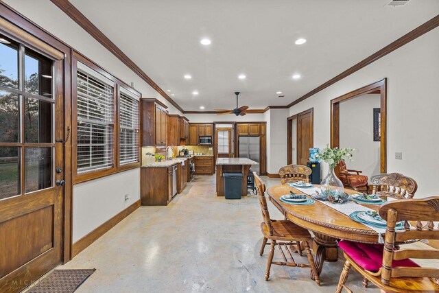 436 Goldsberry Cir, Shreveport, LA 71106 - dining space featuring ornamental molding, baseboards, ceiling fan, recessed lighting, and finished concrete floors