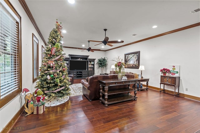 living room with crown molding, ceiling fan, and dark hardwood / wood-style floors