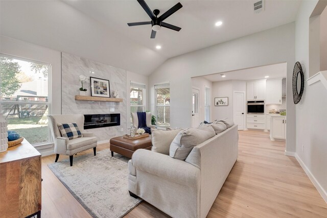 dining area with an inviting chandelier, light hardwood / wood-style flooring, and sink