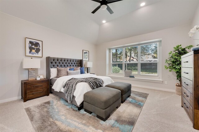 living room featuring a fireplace, ceiling fan, hardwood / wood-style floors, and lofted ceiling