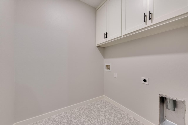 laundry room with washer hookup, cabinet space, electric dryer hookup, and baseboards