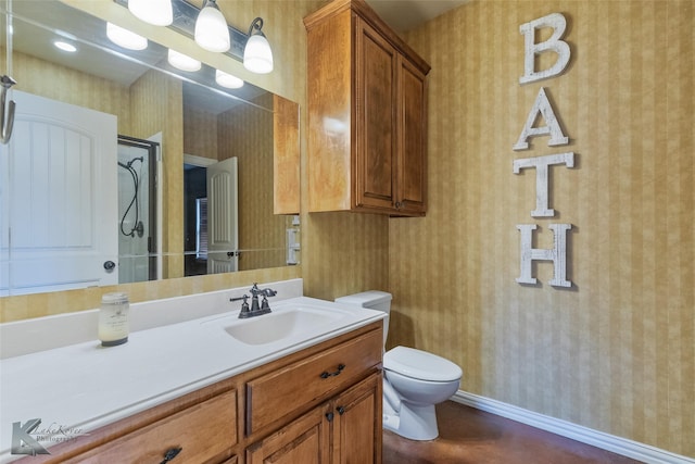 bathroom with vanity and toilet