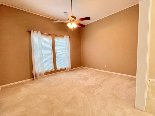 unfurnished room featuring ceiling fan, carpet, and ornamental molding