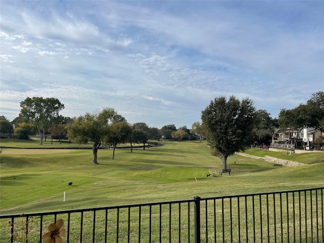 view of property's community featuring a lawn