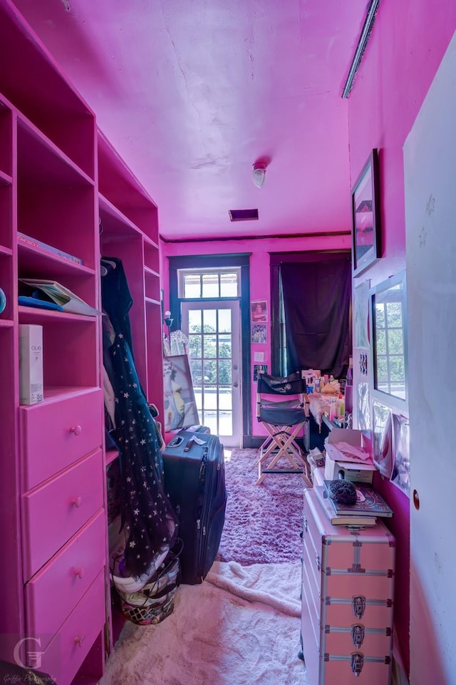 bedroom with light colored carpet