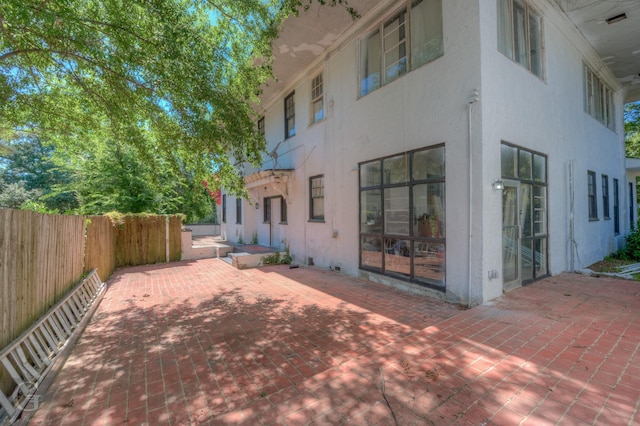 back of house featuring a patio area