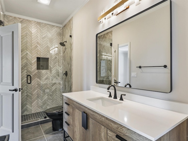 bathroom with tile patterned floors, vanity, a shower with door, crown molding, and toilet