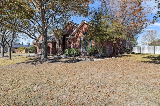 exterior space with a front lawn