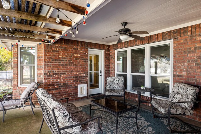 view of patio featuring ceiling fan and an outdoor hangout area