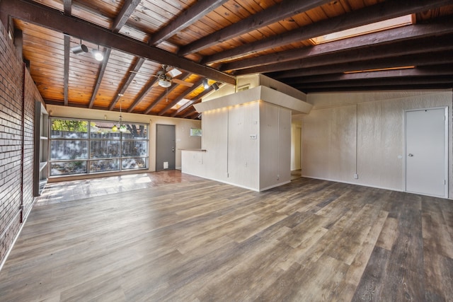 unfurnished living room featuring hardwood / wood-style flooring, vaulted ceiling with beams, ceiling fan, and wood ceiling