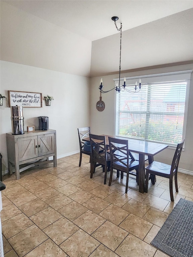 dining room featuring vaulted ceiling and a notable chandelier