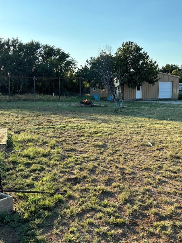 view of yard with a garage