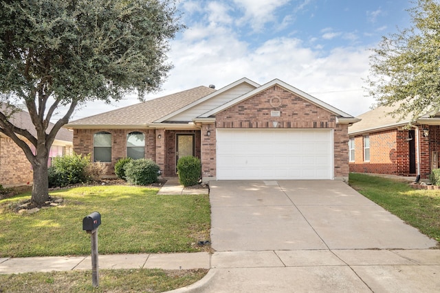 ranch-style house featuring a front lawn and a garage