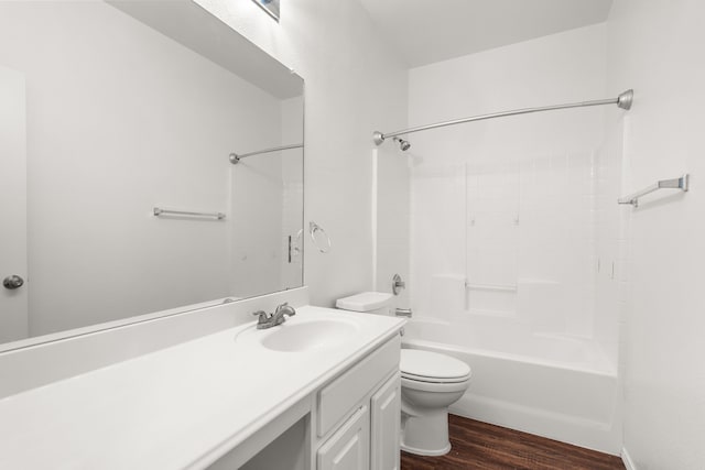 full bathroom with vanity, shower / bathtub combination, toilet, and wood-type flooring