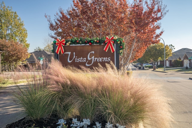 view of community sign