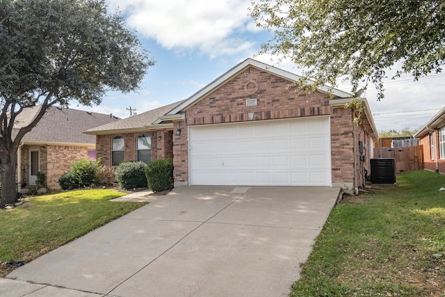 ranch-style house with a front lawn, a garage, and central AC unit